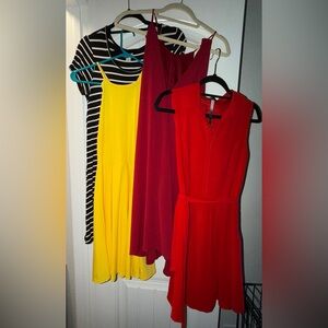 Lot of 4 dresses - black and white striped, yellow, maroon, and red